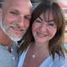 Daniel and Mel Brown smiling together in a close-up photo
